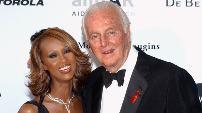 French fashion designer Hubert de Givenchy pictured with and Somalian-born model Iman in May 2002