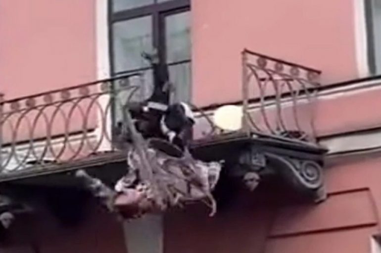 Scary video: Couple fighting and falling from the balcony