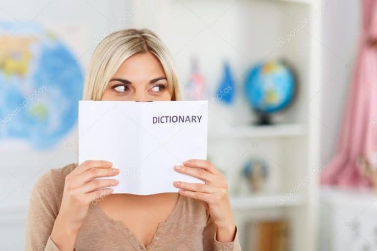 depositphotos 87013556 stock photo nice girl reading dictionary Research, Italian, foreign languages