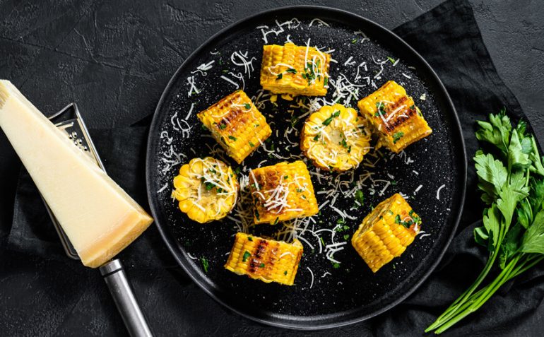 sweet corn grilled on fire with parmesan and parsley cook recipes
