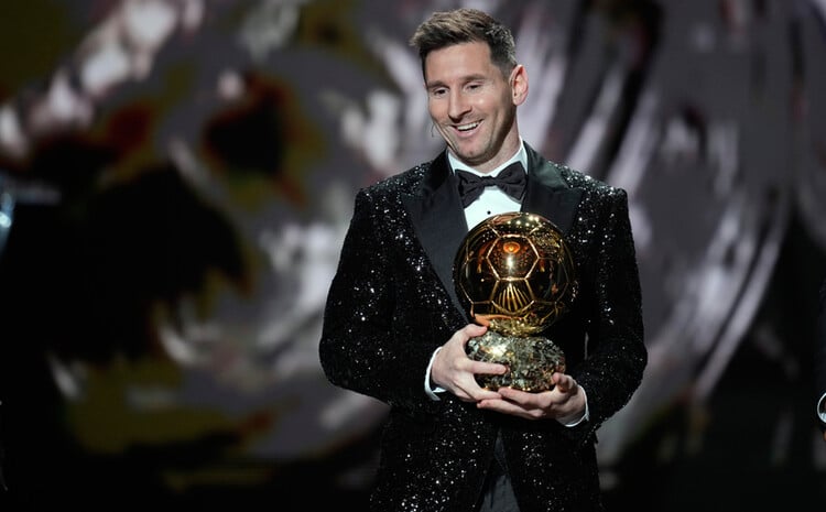 Messi with the Golden Ball award