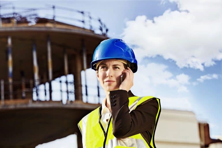 woman onsite of a large construction project 523317882 5c29902546e0fb000183a192 Information, profession, Conference