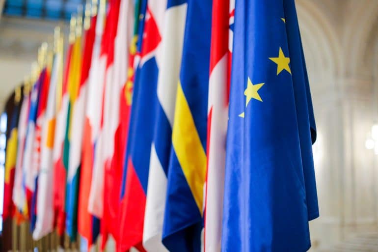 EU member state flags standing beside each other Derenia