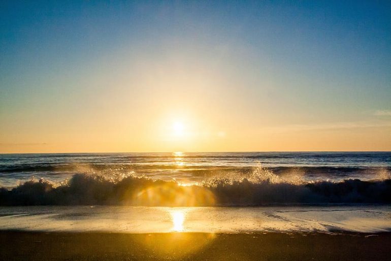 sunset sun rays beach sand Καιρός